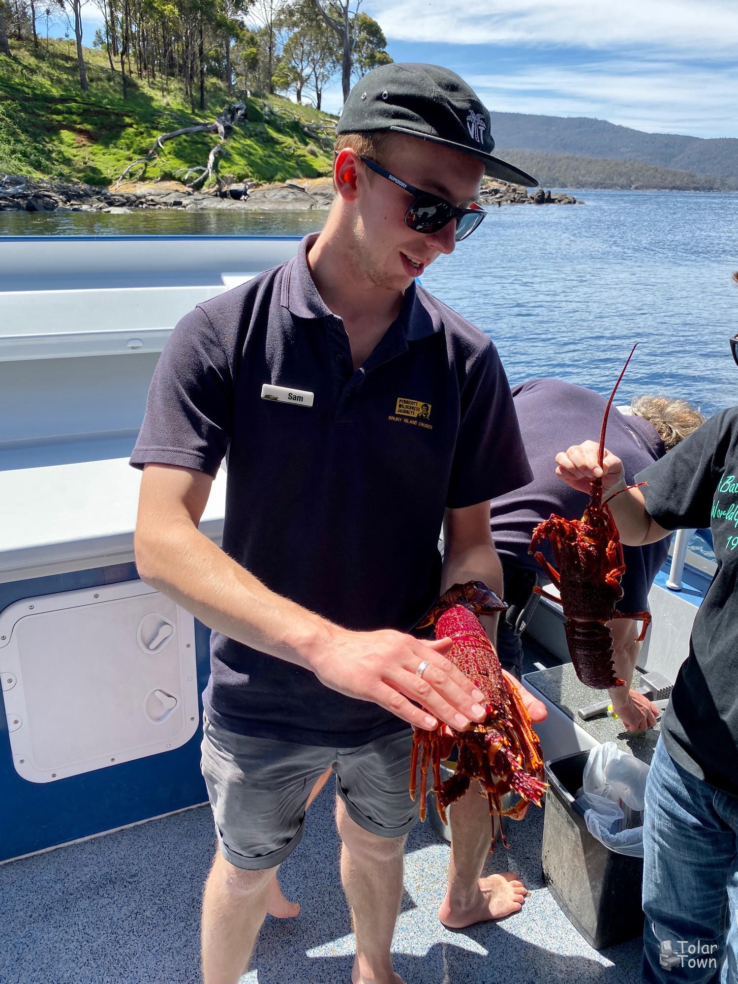 Sam petting the rock lobster
